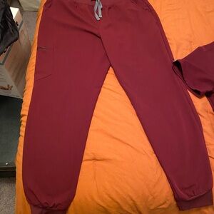 Figs scrubs. Maroon. Both size large.